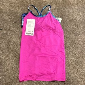 Pink and blue ivivva tank built in bra pad inserts neber worn